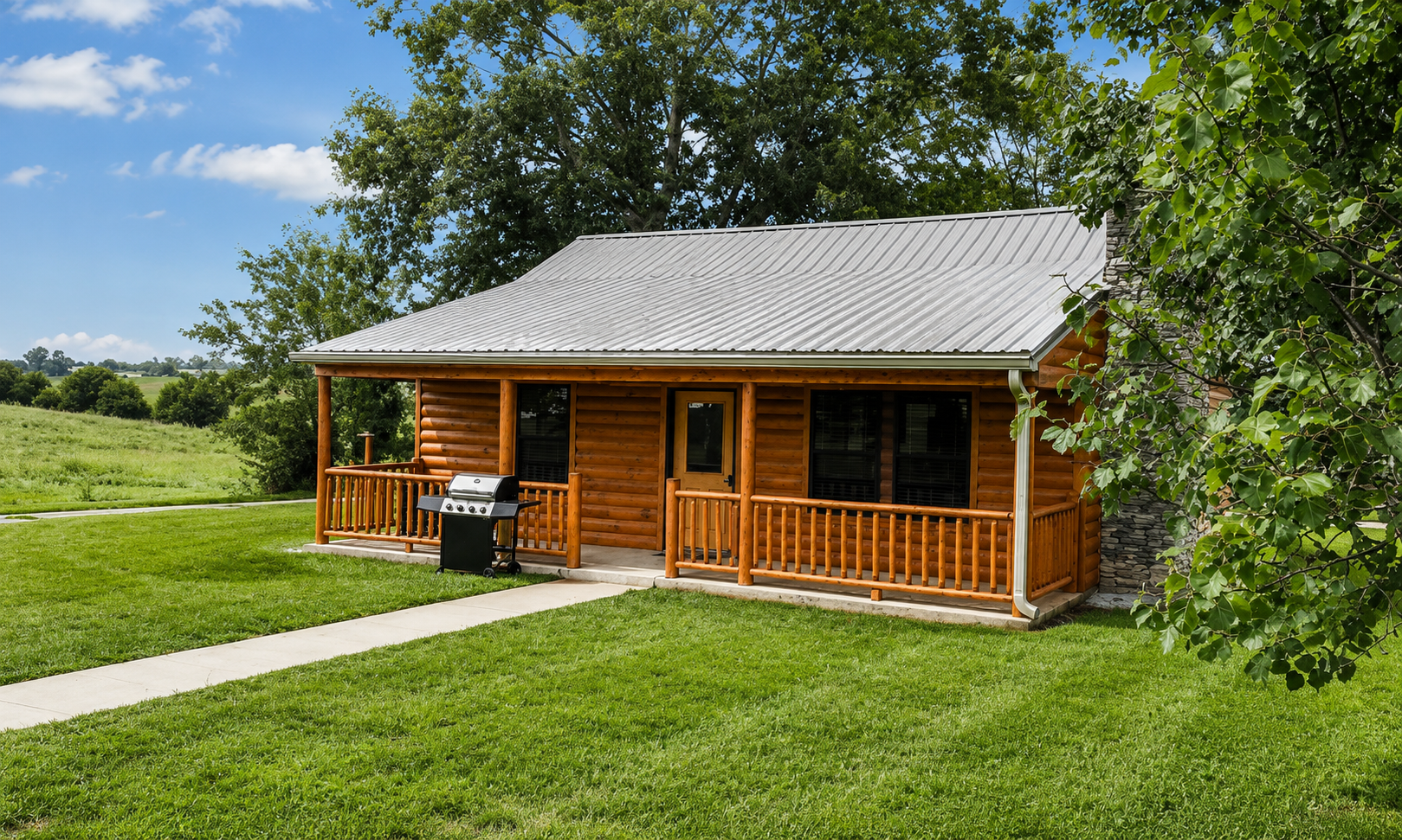The Bourbon Escape Cabin exterior with a covered porch
